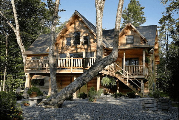 exterior view of log home from driveway