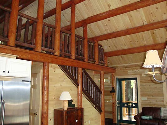 Rustic exposed wooden ceiling beams.